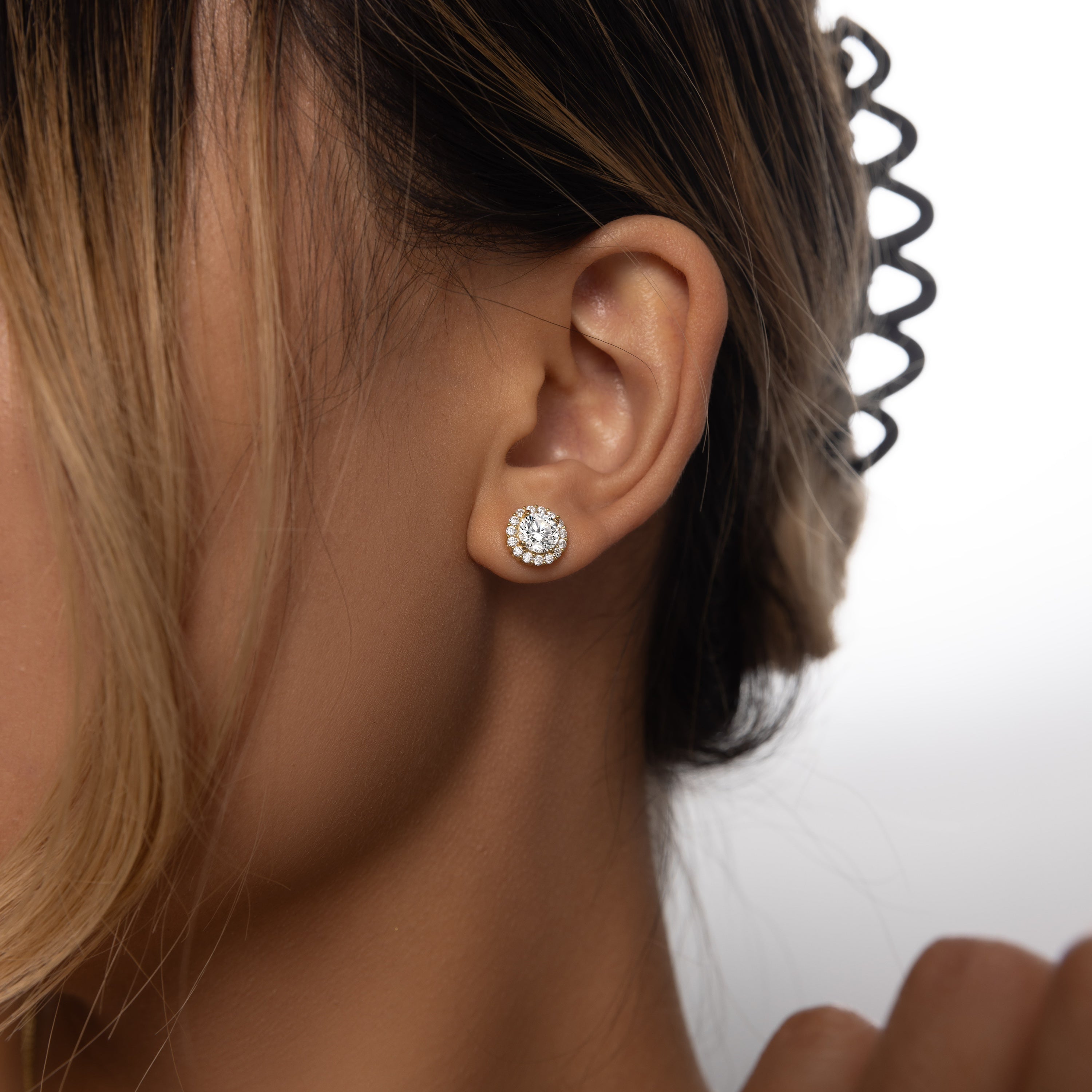 Brilliance Halo Studs in 18 carat gold vermeil, featuring a brilliant Moissanite center stone surrounded by a halo of smaller stones, perfect for daily wear or as a thoughtful gift.