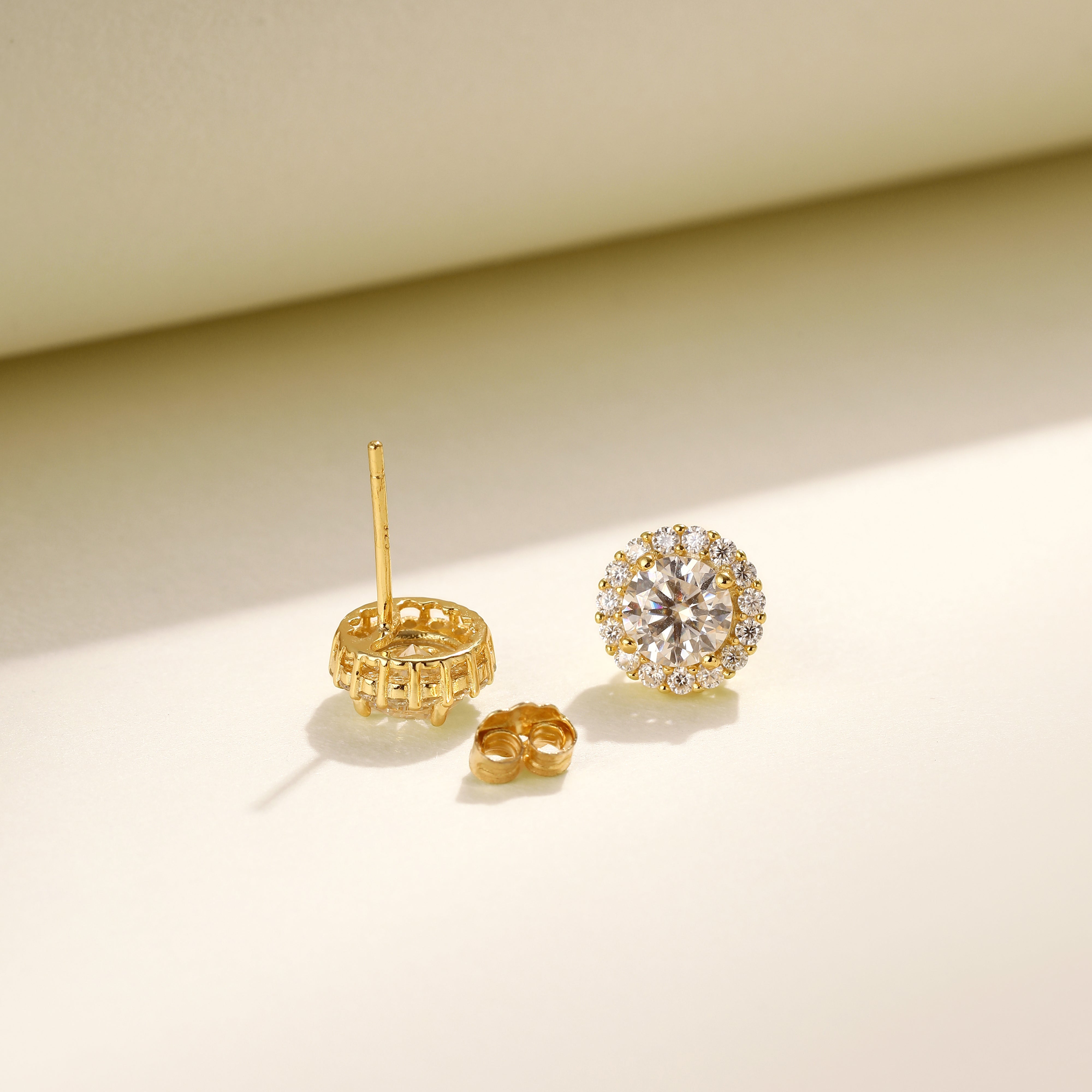 Brilliance Halo Studs in 18 carat gold vermeil, featuring a brilliant Moissanite center stone surrounded by a halo of smaller stones, perfect for daily wear or as a thoughtful gift.